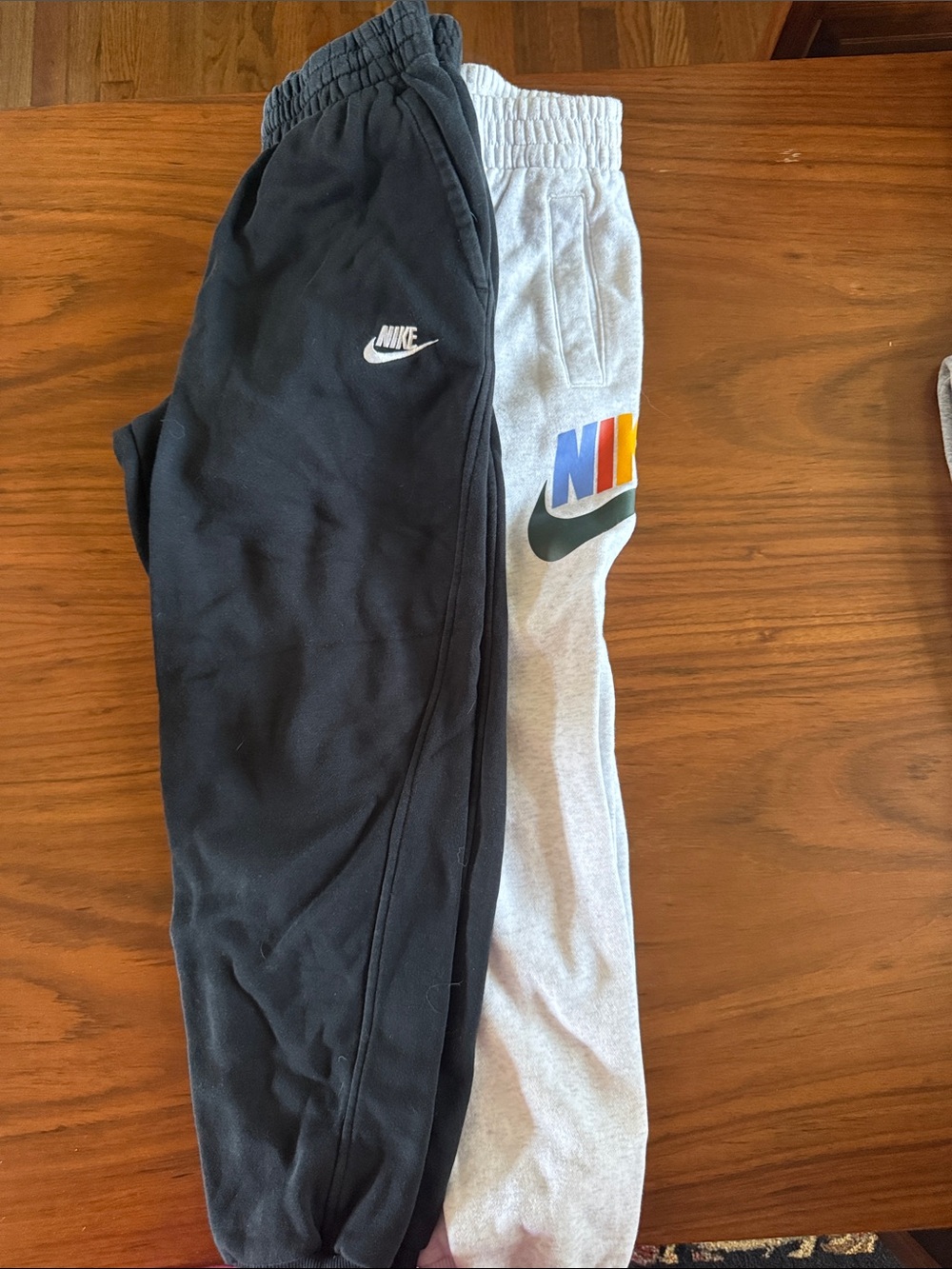 Nike Kids Two-Tone Sweatpants – Black & Light Gray with Multicolor Logo